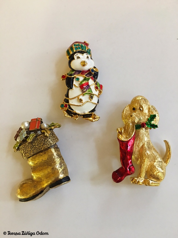 ART(c) Christmas boot, Christopher Radko penguin pin and Gerrys Jewelry Co. puppy dog pin. 