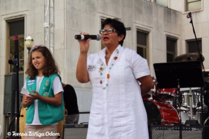 Maricela Mendez, of Girl Scouts of North Central Alabama speaks from the main stage about Girl Scouting.