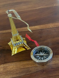 Eiffel Tower and Compass to commemorate retirement and travel this year.