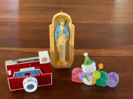 Fisher Price camera, an ornament to commemorate this crazy year and I always add one ornament of the Virgin Mary or the manger every year.