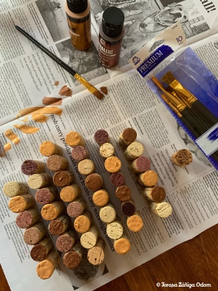 I decided to paint the corks that had designs on the end to keep the pumpkin uniform looking.